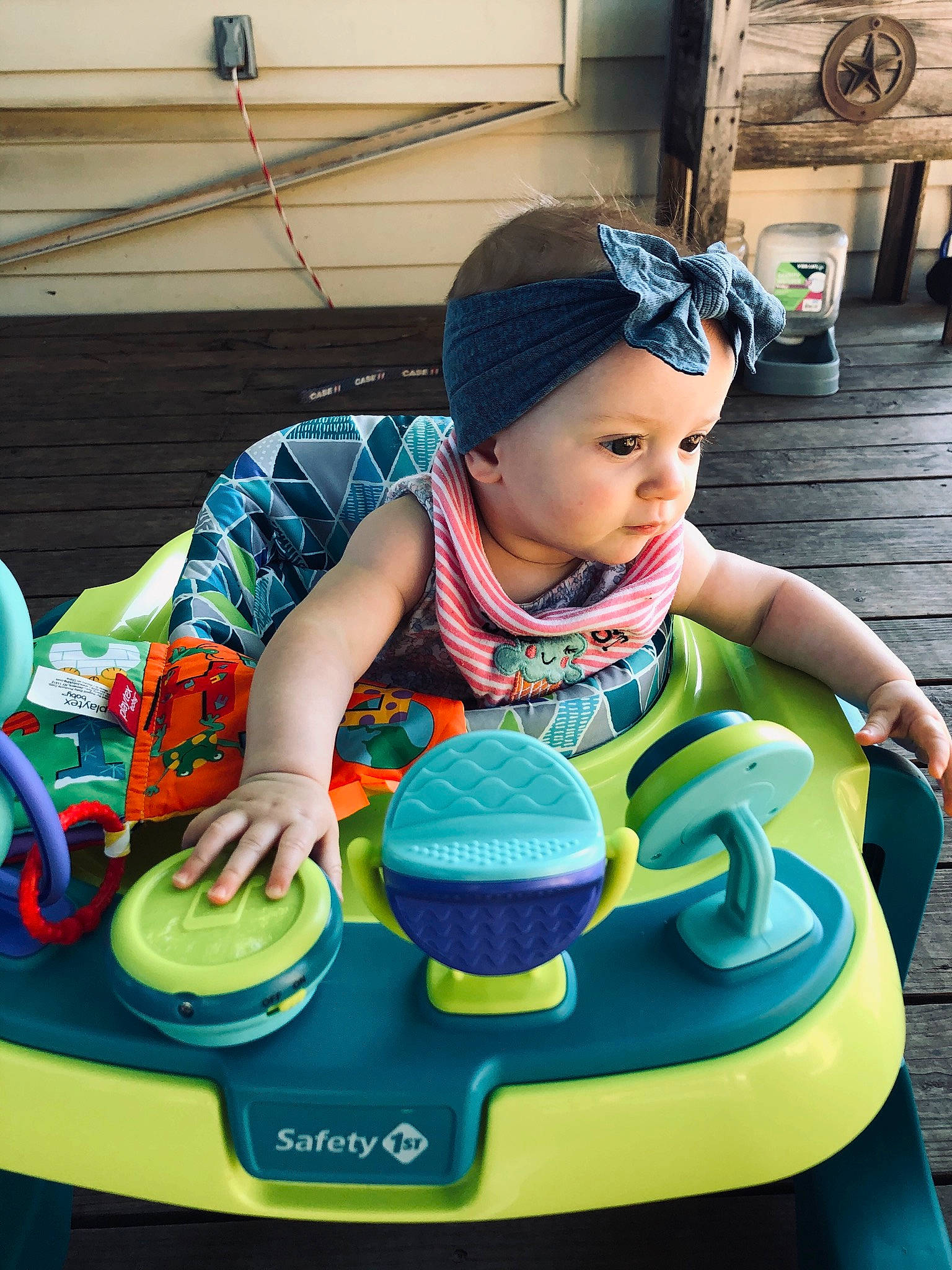 Collins is registered to the contest to win money with this photo: baby, cap, child, cool, games, hat, headgear, headwear, person, play, recreation, sitting, sun_hat, toddler, vacation