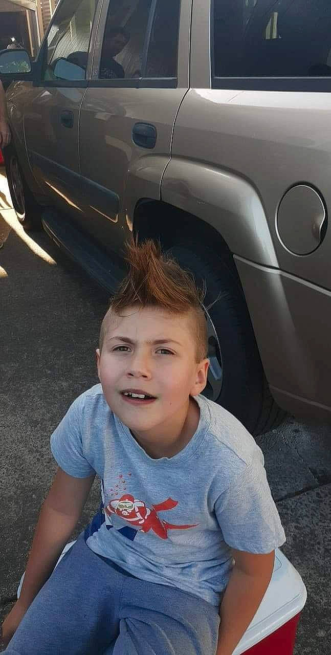 Avalee is registered to the contest to win money with this photo: alloy_wheel, automotive_design, automotive_exterior, automotive_lighting, automotive_tire, black, bumper, car, cool, fender, hood, light, motor_vehicle, person, personal_luxury_car, photograph, tire, vehicle, vehicle_door, wheel