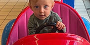 Ezio participe au concours pour gagner de l'argent avec cette photo : toddler, child, mickey_mouse, arcade, kiddie_ride, colorful, toy_car, steering_wheel, indoor, mall, floor_tiles, blond_hair, blue_eyes, plastic, amusement, playful, cute, portrait, entertainment, fun