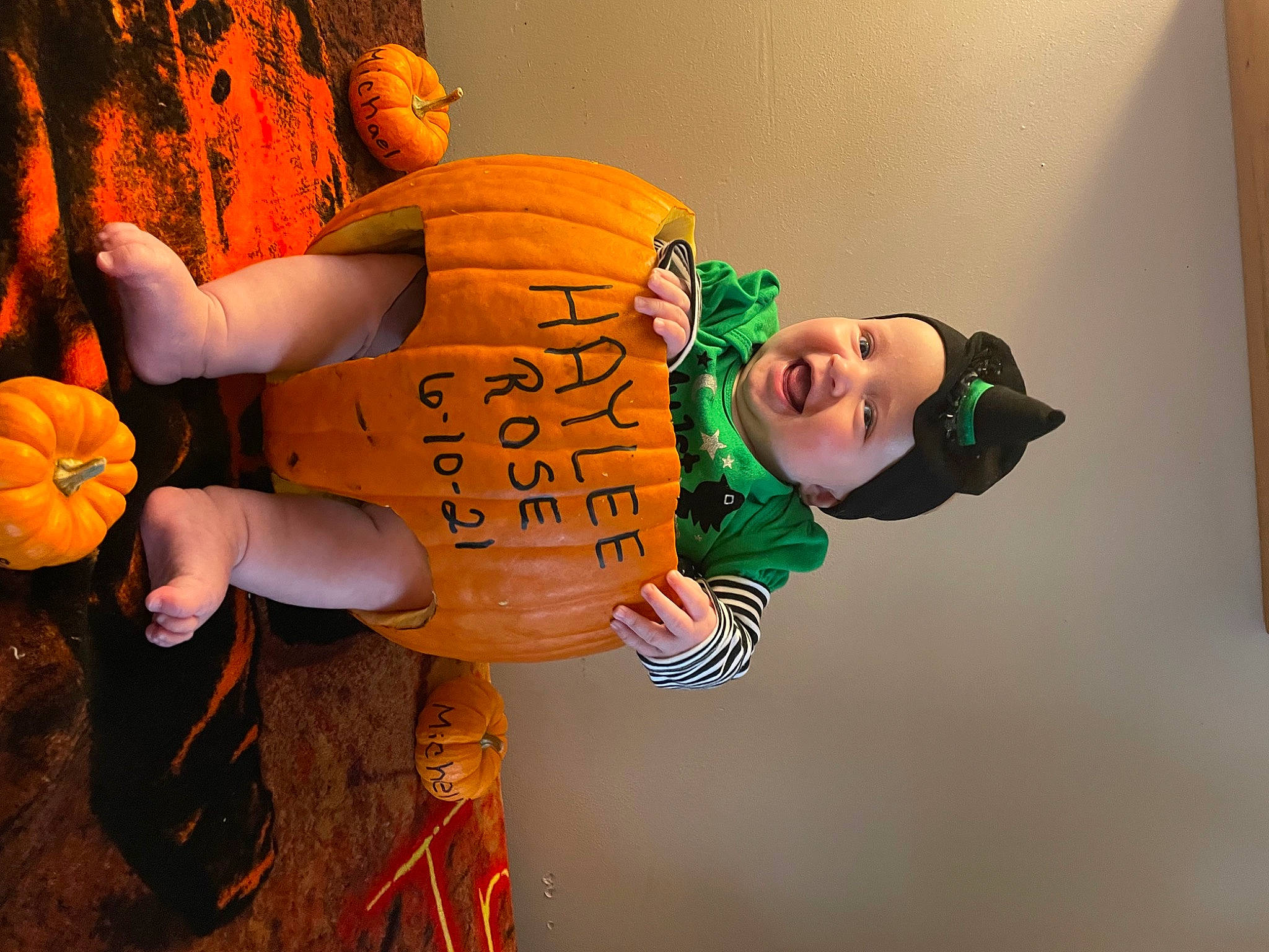 Haylee is registered to the contest to win money with this photo: animation, arm, boot, calabaza, cucurbita, door, fruit, fun, gourd, happy, hat, headwear, jack_o_lantern, natural_foods, orange, person, plant, pumpkin, squash, tree