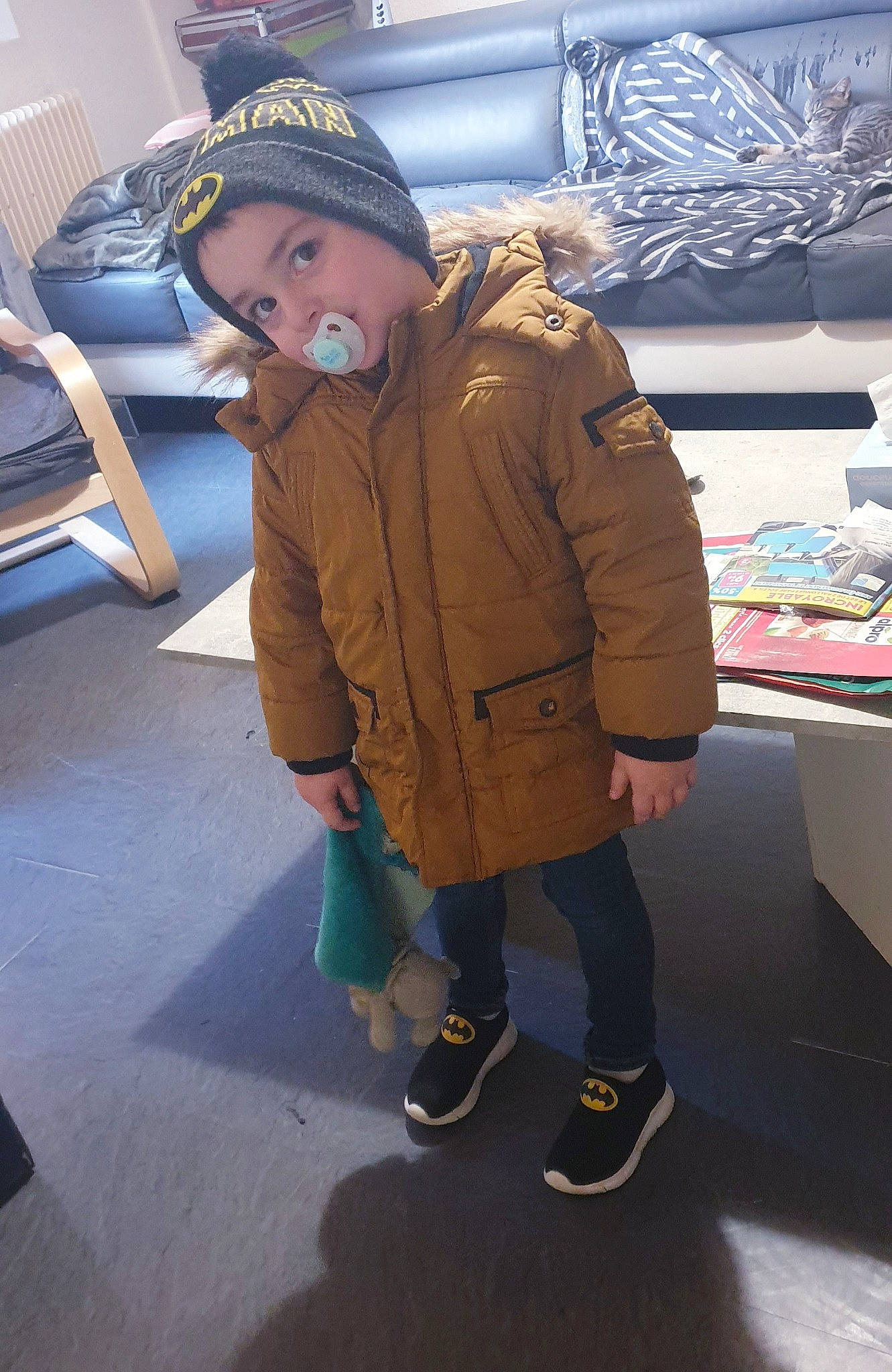Tobias participe au concours pour gagner de l'argent avec cette photo : boot, electric_blue, fashion, fashion_accessory, fashion_design, flooring, fun, fur, fur_clothing, headwear, jacket, knee, leisure, overcoat, person, personal_protective_equipment, sleeve, street_fashion, toddler, travel
