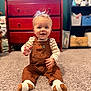Joseph is registered to the contest to win money with this photo: baby, child, carpet, overalls, socks, smile, indoor, dresser, furniture, shelving, storage, clothing, person, happy, hair, room, floor, cute, toddler, casual