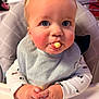 baby, child, blue_eyes, high_chair, snack, bib, toddler, indoor, cute, food, hands, face, expression, hair, clothing, table, feeding, meal, infant, cheeks