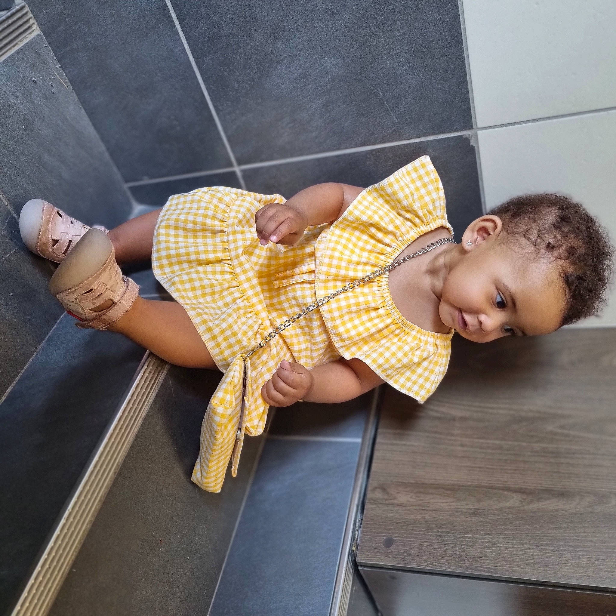 Ilianna participe au concours pour gagner de l'argent avec cette photo : baby, comfort, doll, fashion_accessory, foot, human_leg, joint, knee, lap, leg, pattern, person, plaid, sandal, sitting, sock, tartan, thigh, toddler, waist