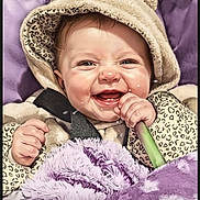 Elza joined the competition — help win amazing prizes! baby, blanket, child, clothing, cozy, cute, expression, face, fuzzy, happy, hood, indoor, infant, leopard_print, portrait, purple, seated, smiling, soft, warm