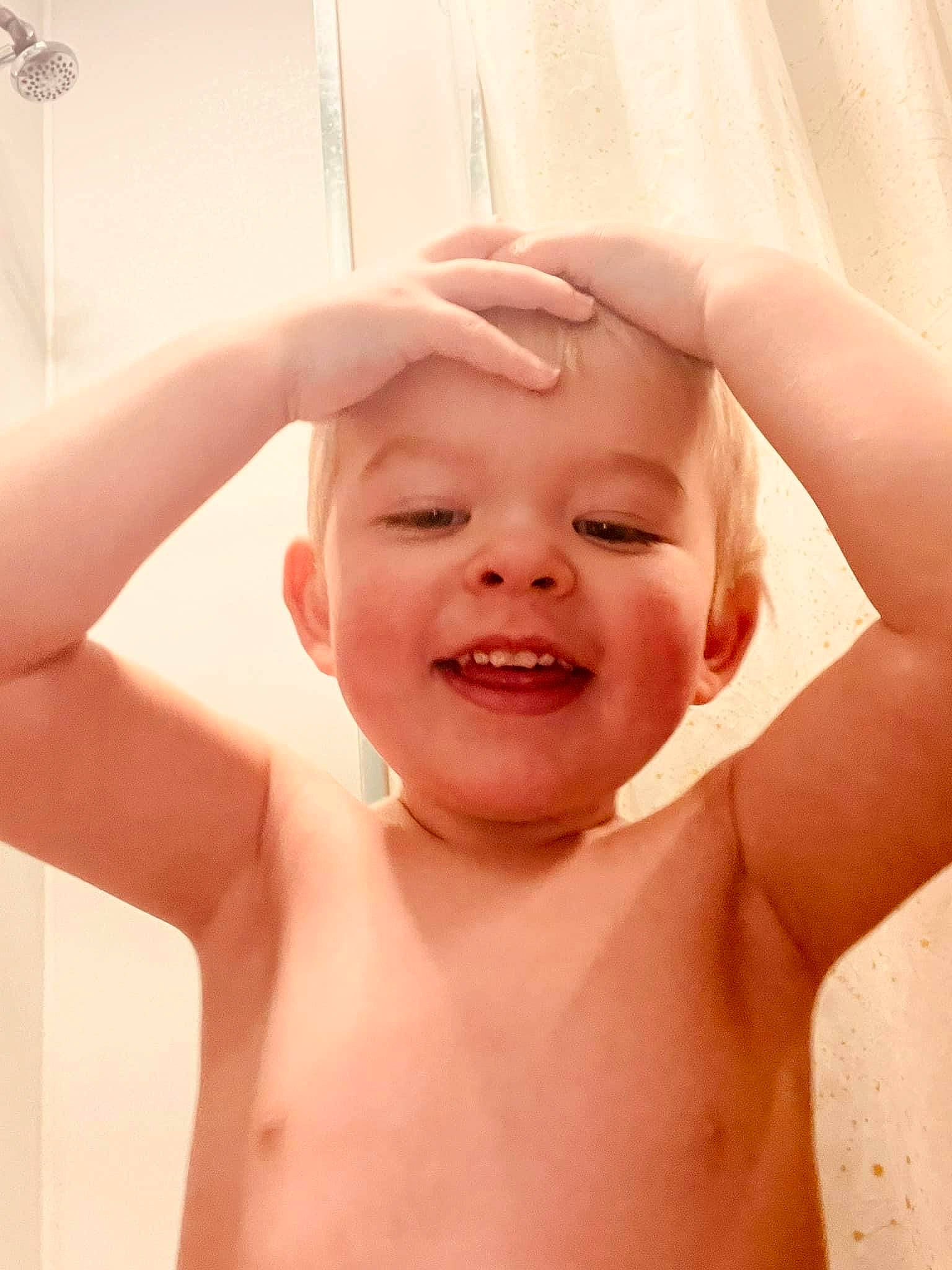 Cillian is registered to the contest to win money with this photo: baby, bathing, cheek, chest, ear, eyelash, finger, gesture, happy, human_body, jaw, lip, mouth, muscle, nose, person, skin, smile, stomach, toddler