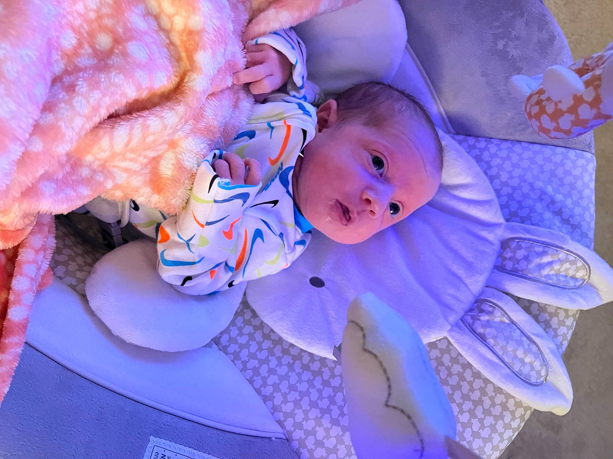 Elliana is registered to the contest to win money with this photo: azure, baby, baby_products, baby_toddler_clothing, child, comfort, electric_blue, event, happy, iris, linens, magenta, pattern, person, petal, pink, purple, room, toddler, tree
