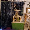Kolohe is registered to the contest to win money with this photo: cat, cat_tree, tabby_cat, curtains, beaded_curtain, toys, indoor, home_decor, mirror, wall_art, plush_toy, window, furniture, pet, scratching_post, hanging_decorations, sitting, resting, cozy, domestic