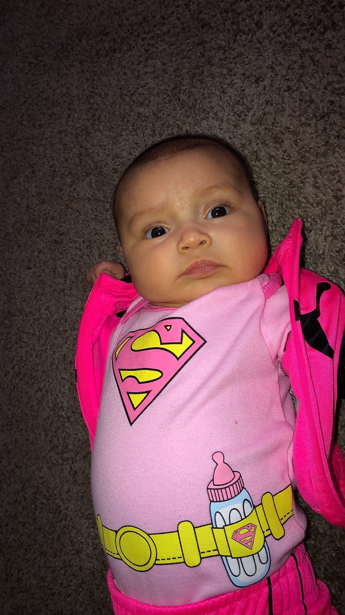 Avalynn is registered to the contest to win money with this photo: baby, baby_carriage, baby_products, baby_toddler_clothing, bib, carmine, cheek, child, face, happy, lip, magenta, nose, person, personal_protective_equipment, pink, skin, sleeve, smile, t_shirt