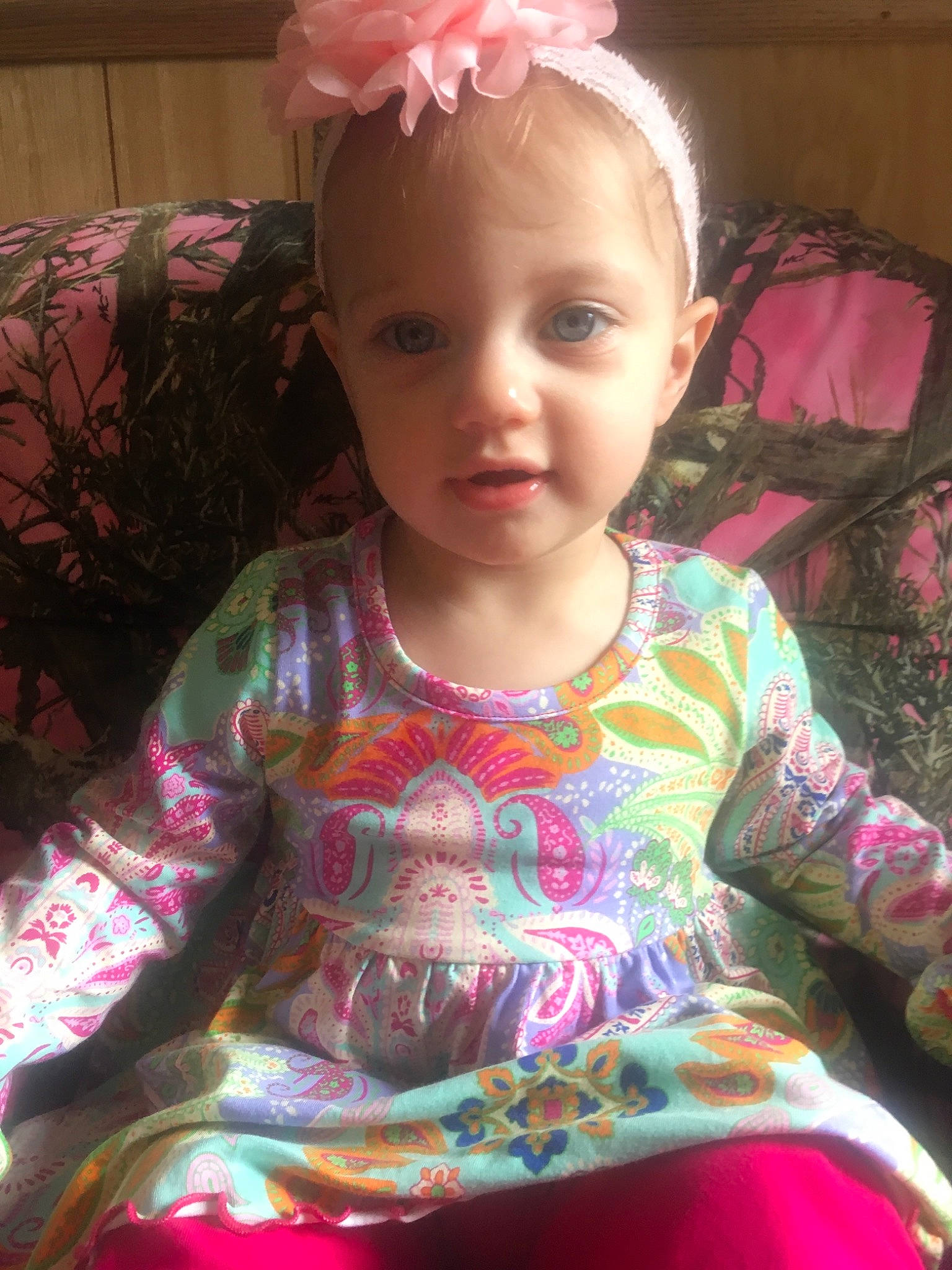 Keira is registered to the contest to win money with this photo: baby, baby_toddler_clothing, cheek, child, hair_accessory, headband, headgear, person, pink, smile, toddler