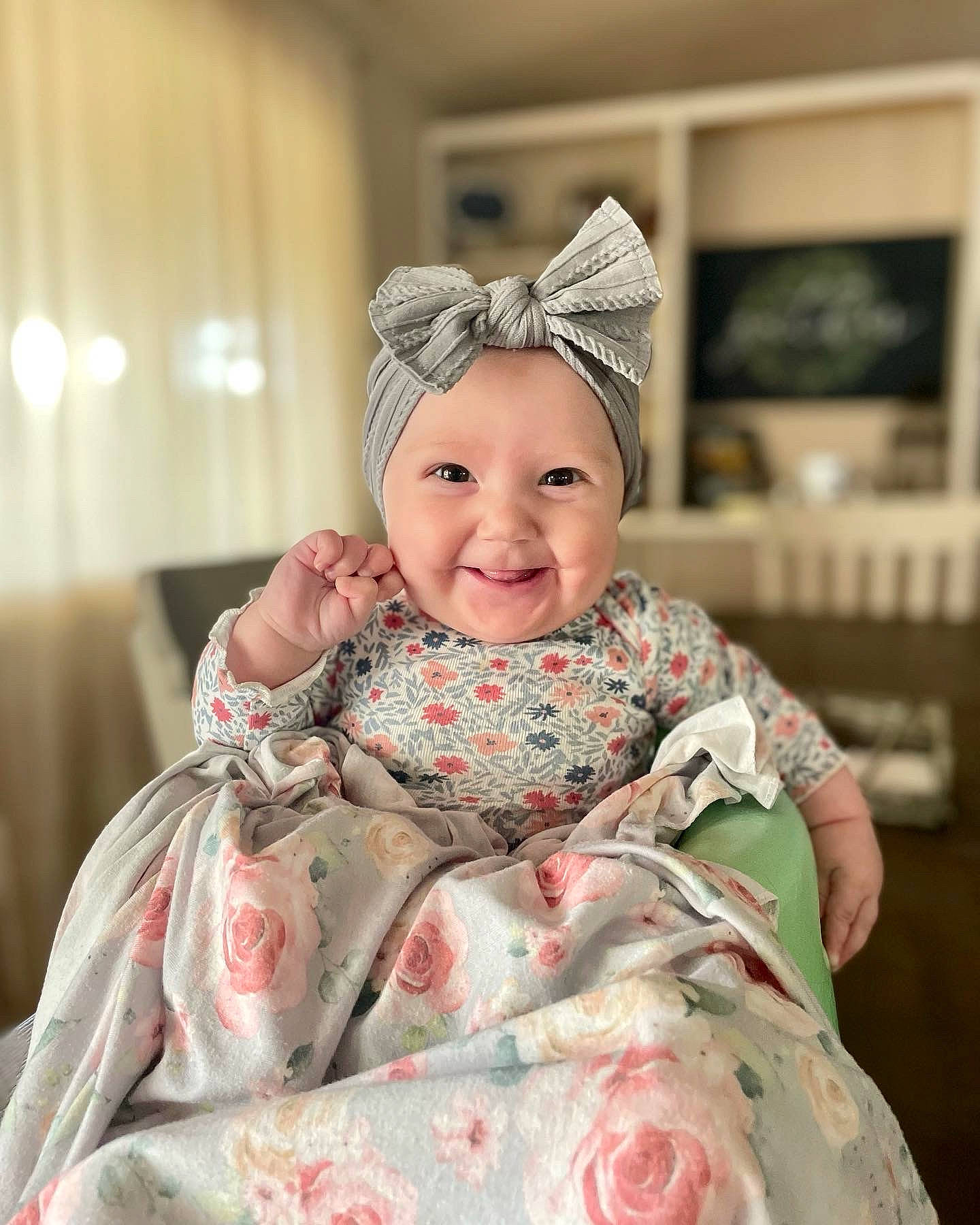 Macie is registered to the contest to win money with this photo: baby, bridal_accessory, bridal_clothing, dress, embellishment, event, eye, face, fashion_design, happy, head, headband, headpiece, headwear, joy, pattern, peach, person, skin, sleeve