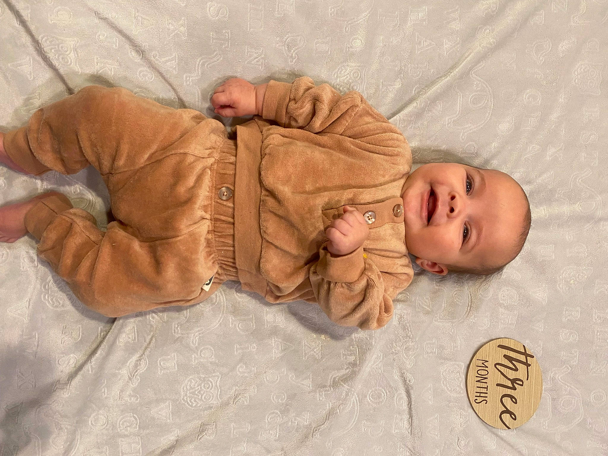 Evangeline joined the competition — help win amazing prizes! baby, baby_toddler_clothing, cheek, child, comfort, face, flooring, fur, linens, outerwear, person, portrait_photography, sitting, skin, sleep, sleeve, textile, toddler, wood