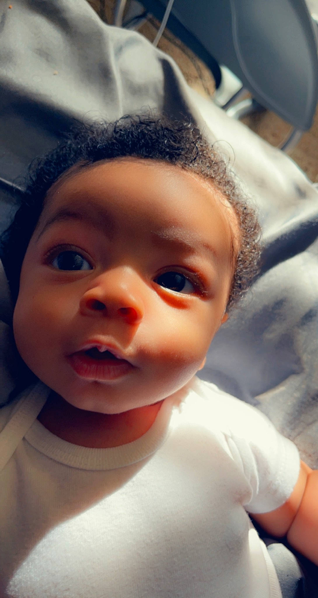 Michael is registered to the contest to win money with this photo: baby, cheek, ear, eye, eyebrow, eyelash, finger, flash_photography, forehead, gesture, happy, head, human_body, iris, jaw, lip, mouth, nose, person, skin