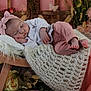 baby, sleeping, headband, pink_clothing, white_top, blanket, wooden_bench, flowers, butterflies, soft_lighting, cozy, curled_up, peaceful, indoors, portrait, infant, decor, fabric, hand, feet