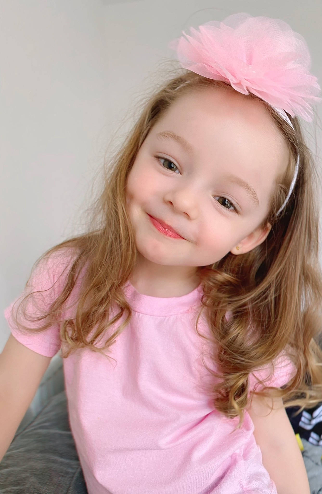 Elsa Miriam is registered to the contest to win money with this photo: chin, clothing, dress, eye, eyebrow, eyelash, flash_photography, happy, headpiece, iris, joy, lip, person, pink, purple, shoulder, skin, sleeve, smile, textile