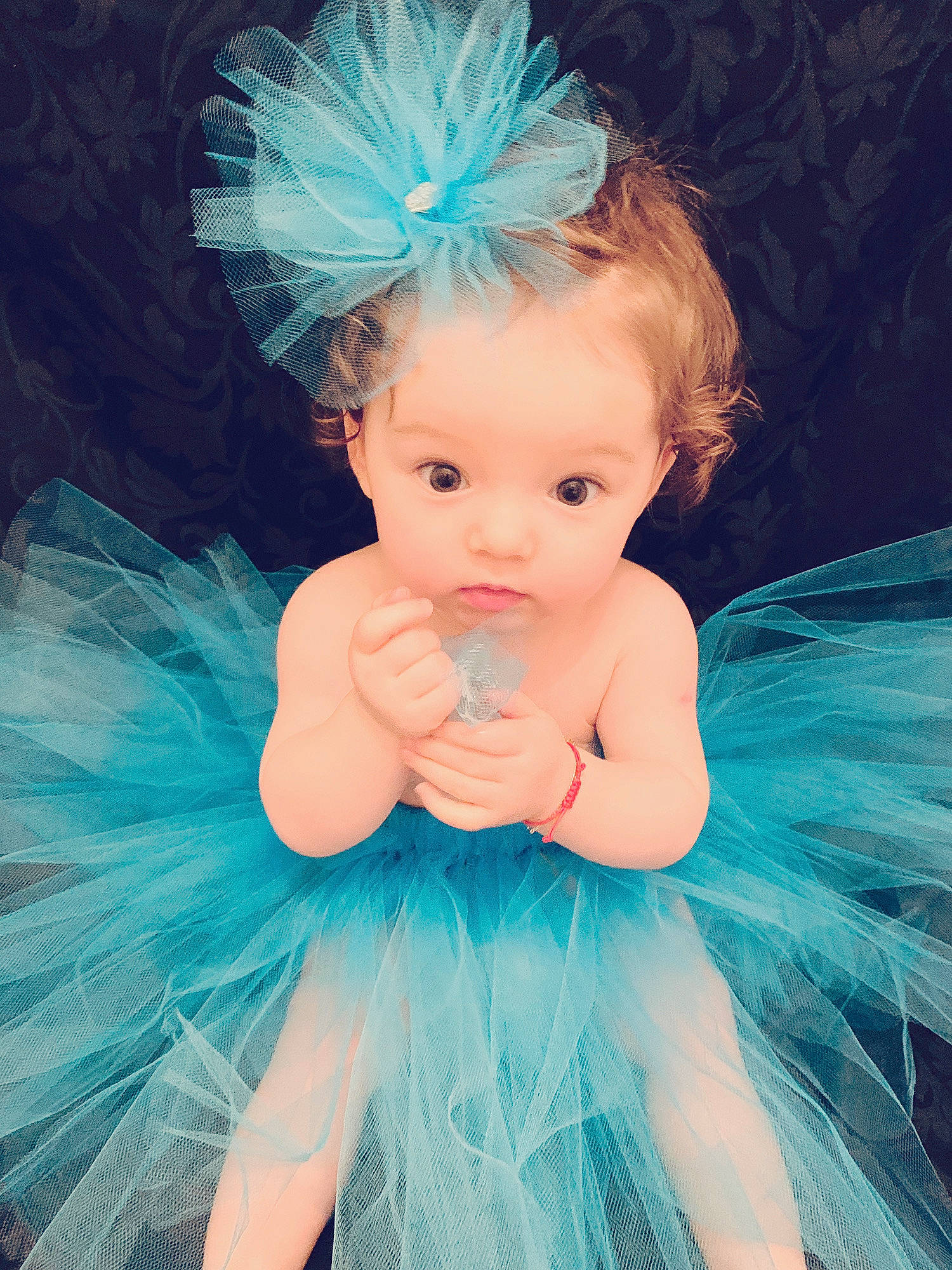 Elsa- Miriam is registered to the contest to win money with this photo: aqua, baby, baby_toddler_clothing, ballet_tutu, blue, child, clothing, costume, costume_accessory, dress, feather, hair_accessory, headpiece, person, pink, product, toddler, turquoise