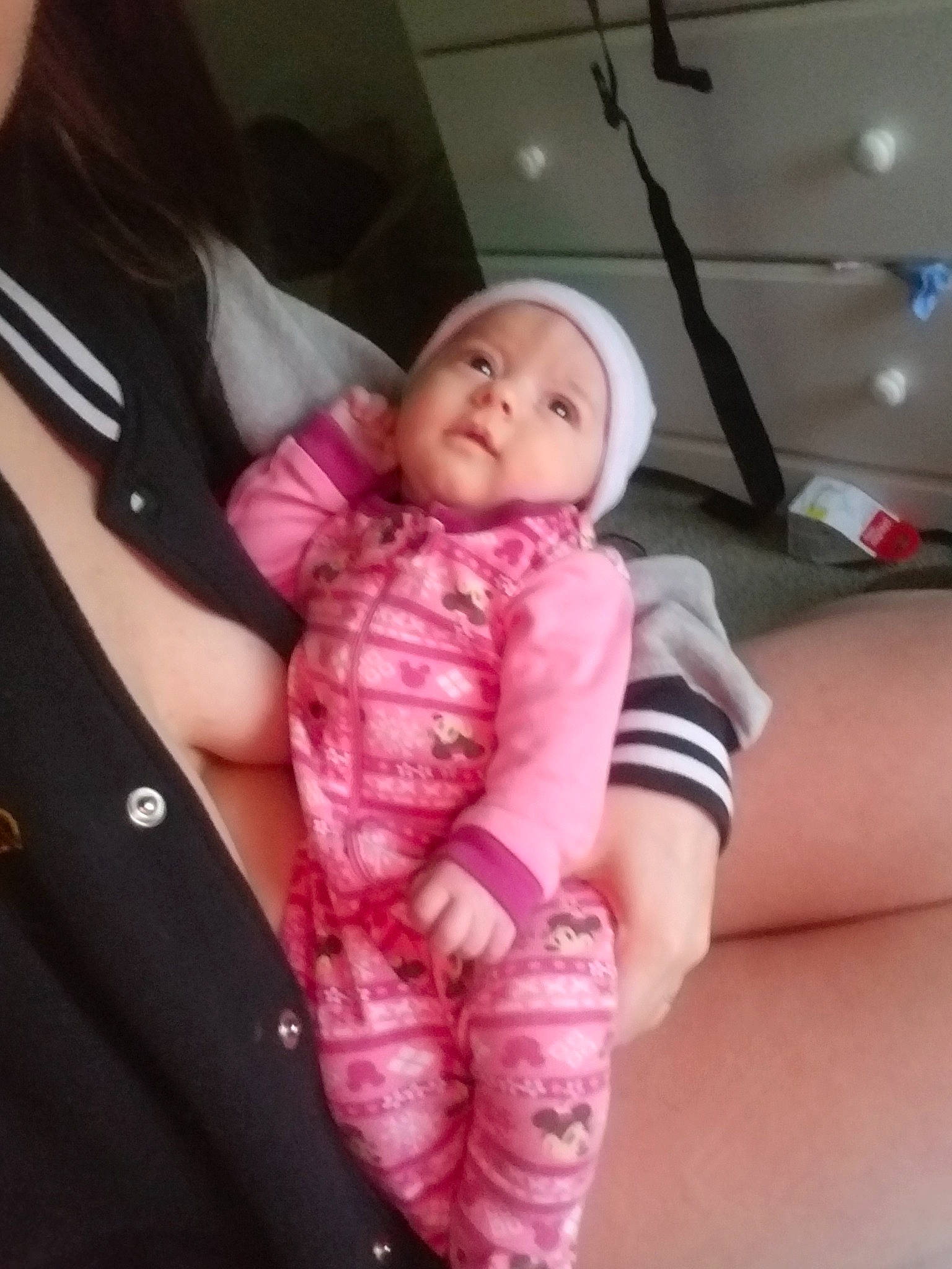 Jenny is registered to the contest to win money with this photo: arm, baby, cheek, child, cool, daughter, eye, face, head, lip, mouth, person, pink, skin, smile, toddler