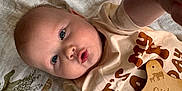 Bowen joined the competition — help win amazing prizes! arm, baby, blanket, child, clothing, curious, eyes, face, indoor, infant, lying_down, pattern, person, selfie, shirt, six_months, skin, tag, text, wooden_tag