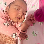 Emirett joined the competition — help win amazing prizes! baby, sleeping, pink_clothing, hat, blanket, pajamas, face, infant, child, cute, peaceful, bed, strawberry_pattern, soft_texture, hand, portrait, indoors, rest, sleep, cozy