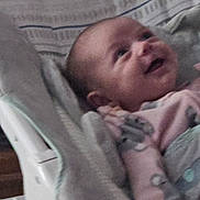 Adalynn joined the competition — help win amazing prizes! baby, infant, smiling, baby_seat, blanket, pink_clothing, face, happy, indoors, child, cute, cozy, patterned_clothing, young_child, lying_down, portrait, small_person, baby_boy_or_girl, soft, resting
