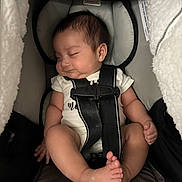 Ean Luka joined the competition — help win amazing prizes! baby, sleeping, car_seat, safety_harness, blanket, infant, child, indoors, cozy, cute, peaceful, soft_lighting, skin, clothing, head, foot, hand, comfort, rest, portrait