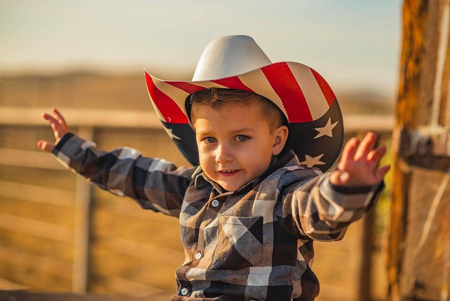 Dillyn is registered to the contest to win money with this photo: baby, baby_toddler_clothing, child, child_model, costume_accessory, costume_hat, cowboy_hat, fashion_accessory, fedora, finger, gesture, hand, happy, hat, headgear, laugh, person, sleeve, sun_hat, thumb
