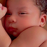 Blessyn joined the competition — help win amazing prizes! baby, close_up, face, curly_hair, sleepy, skin, arm, peaceful, infant, portrait, newborn, soft_light, sparkles, cute, relaxed, child, resting, indoors, toddler, young