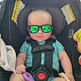 Oliver joined the competition — help win amazing prizes! baby, blue_clothing, car_seat, child, cute, face, foot, hand, head, indoor, infant, plastic_toy, reflection, relaxing, safety, seatbelt, smiling, sunglasses, toy, wooden_toy
