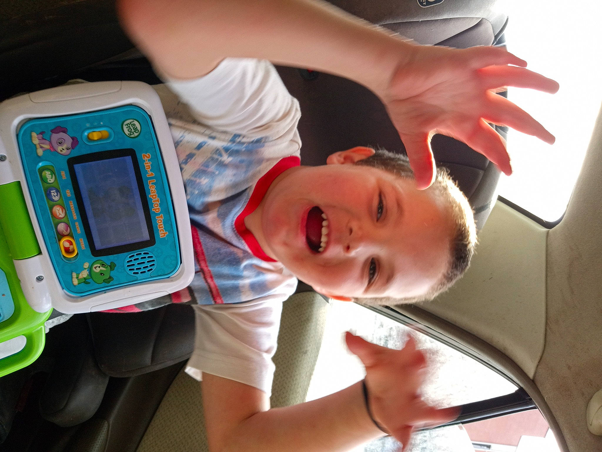 Caleb joined the competition — help win amazing prizes! arm, baby, child, communication_device, eyelash, finger, fun, gadget, hand, happy, leisure, machine, person, play, room, smile, t_shirt, telephony, toddler, vehicle_door