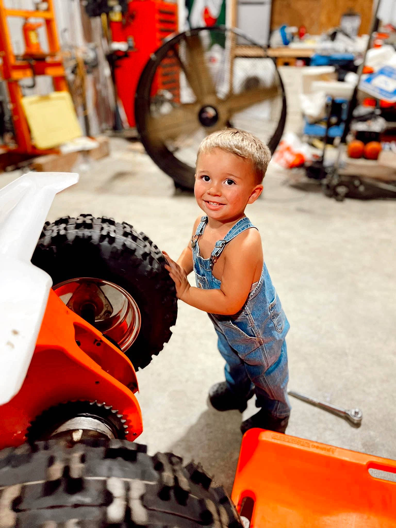 Keaston joined the competition — help win amazing prizes! auto_part, automotive_design, automotive_exterior, automotive_tire, automotive_wheel_system, engineering, fender, joy, machine, motor_vehicle, motorcycle, person, rim, shorts, spoke, synthetic_rubber, tire, tire_care, toddler, tread