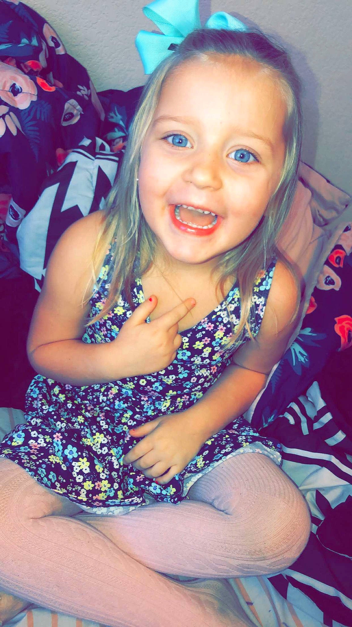 Blakelynn is registered to the contest to win money with this photo: beauty, cheek, child, child_model, chin, eye, face, facial_expression, fun, happy, head, iris, joy, lip, long_hair, mouth, nose, person, sitting, skin