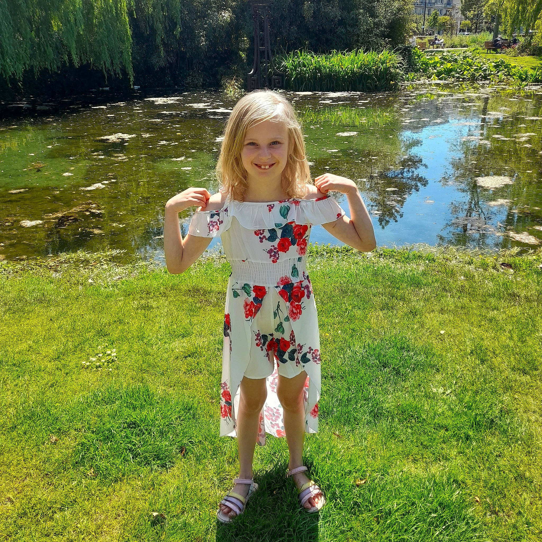 Maelynn participe au concours pour gagner de l'argent avec cette photo : day_dress, dress, grass, grass_family, grassland, green, hair, happy, joy, lake, leisure, meadow, natural_environment, one_piece_garment, people_in_nature, person, plant, smile, summer, toddler