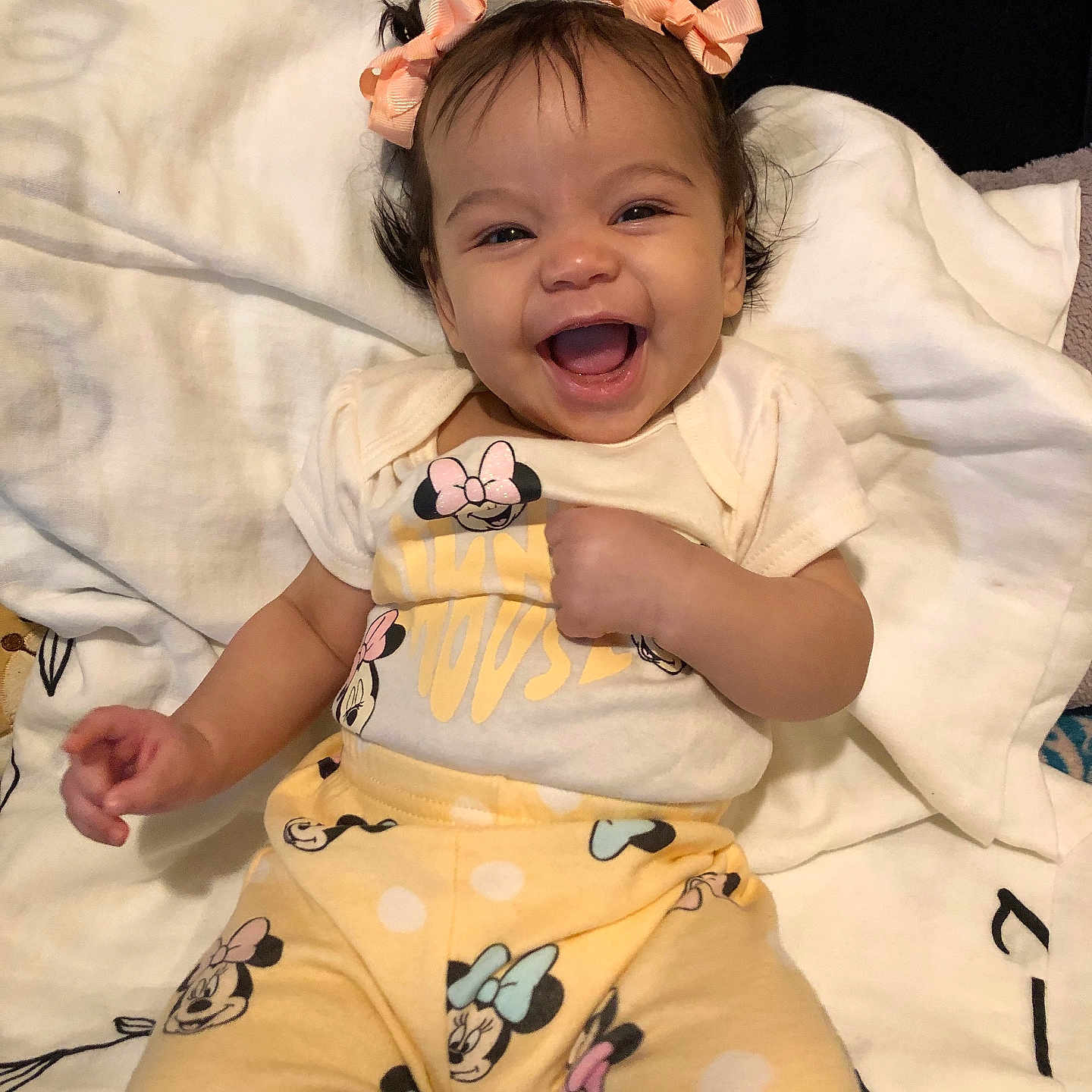 Lola is registered to the contest to win money with this photo: baby, babylaughing, bed, bedroom, blanket, clothing, cushion, face, furniture, happy, head, homedecor, indoors, laughing, pajamas, person, photography, portrait, quilt, room