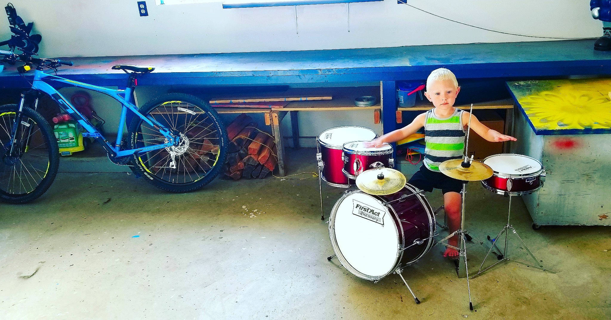 Evan is registered to the contest to win money with this photo: automotive_lighting, automotive_tire, bicycle, bicycle_frame, bicycle_handlebar, bicycle_tire, bicycle_wheel, bicycles_equipment_and_supplies, crankset, cymbal, drum, drum_stick, drumhead, idiophone, membranophone, musical_instrument, musical_instrument_accessory, percussion, person, tire