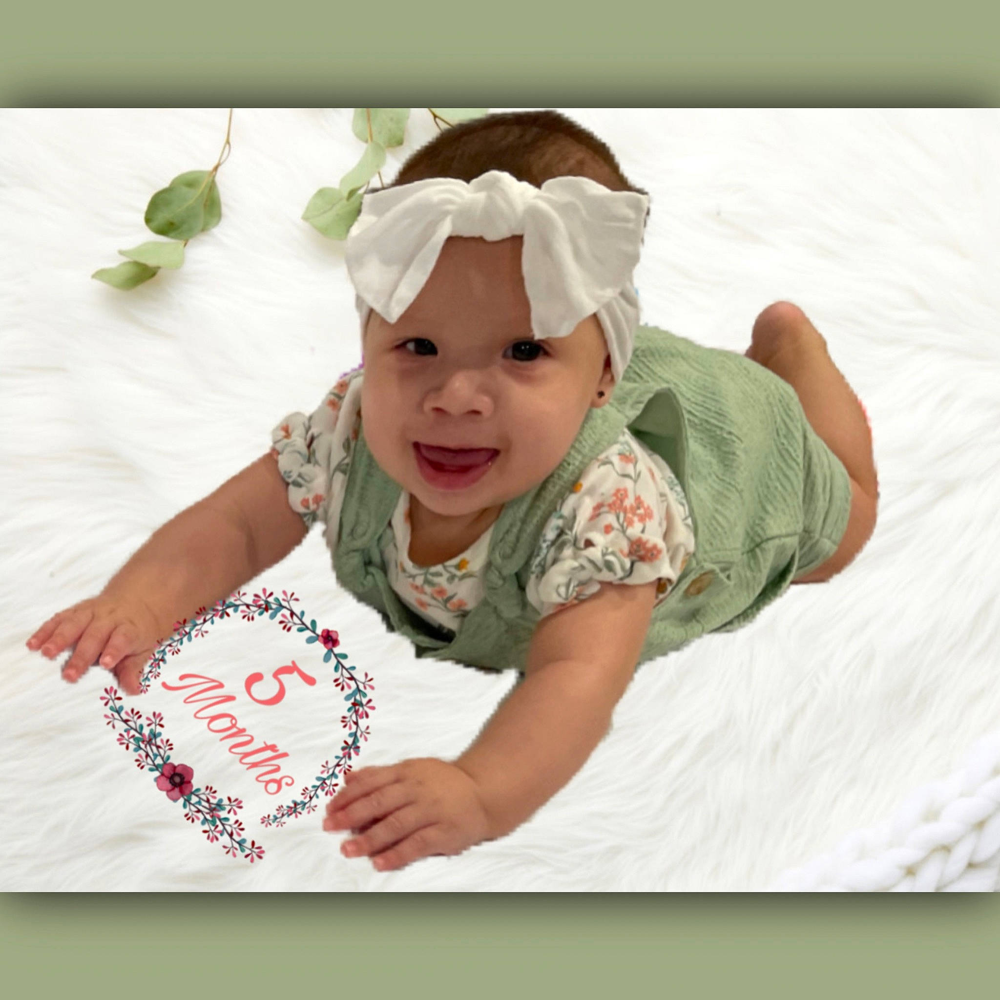 Kyomi is registered to the contest to win money with this photo: baby, baby_toddler_clothing, cap, child, comfort, fashion_accessory, font, fun, happy, headband, headwear, linens, magenta, pattern, person, play, skin, sleeve, smile, t_shirt