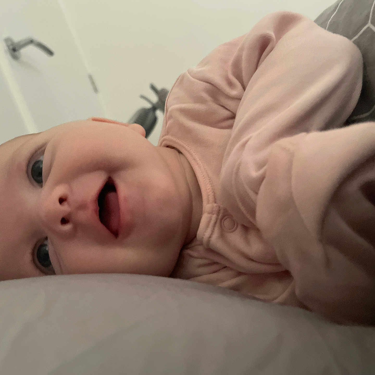 Romi-Mae joined the competition — help win amazing prizes! baby, babylaughing, bodypart, clothing, face, finger, hand, happy, head, hood, hoodie, knitwear, mouth, newborn, person, photography, portrait, smile, sweater, sweatshirt