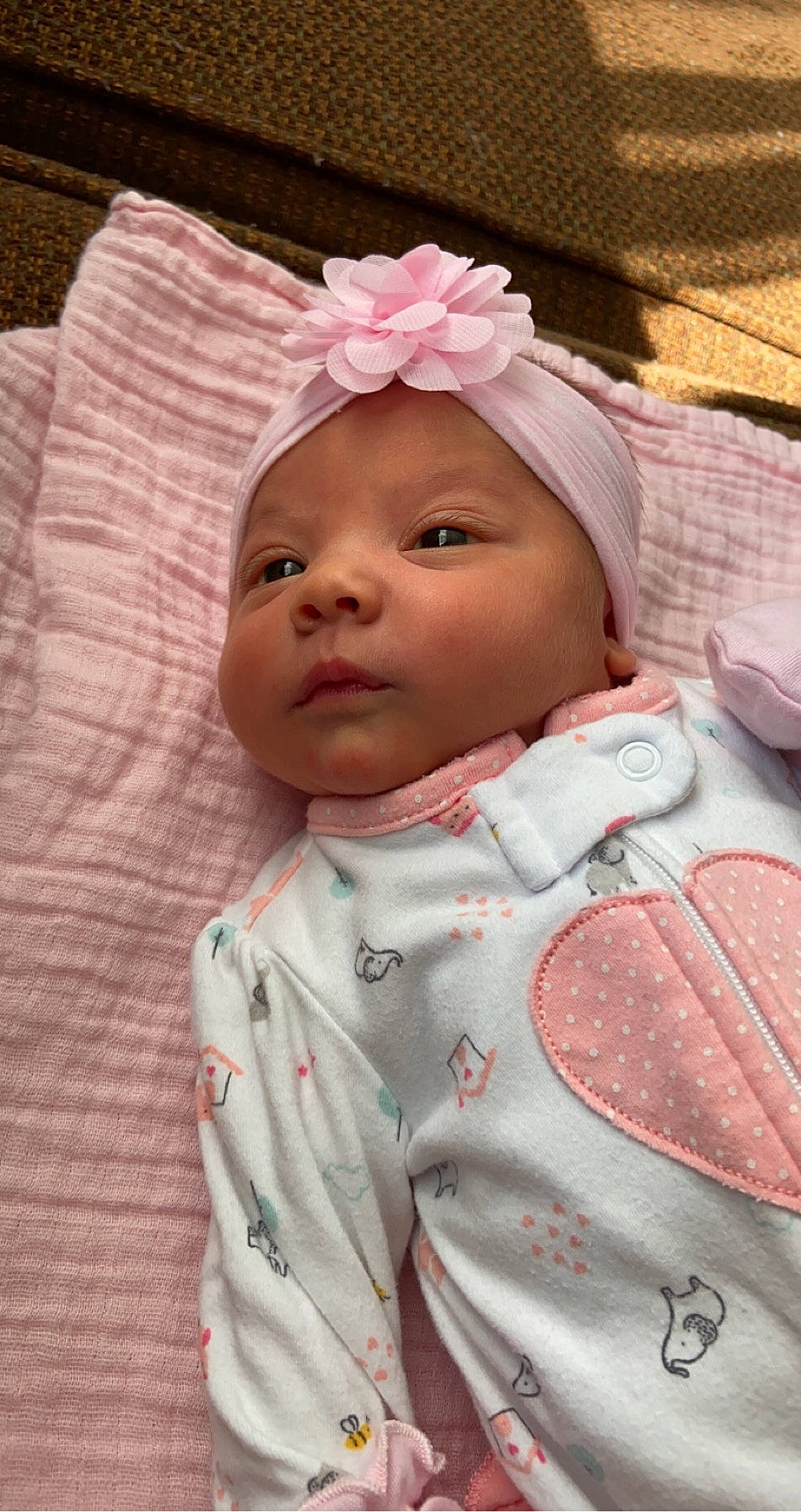 Ophelia is registered to the contest to win money with this photo: baby, baby_products, cheek, child, hair_accessory, head, headgear, headwear, person, pink, product, skin, toddler