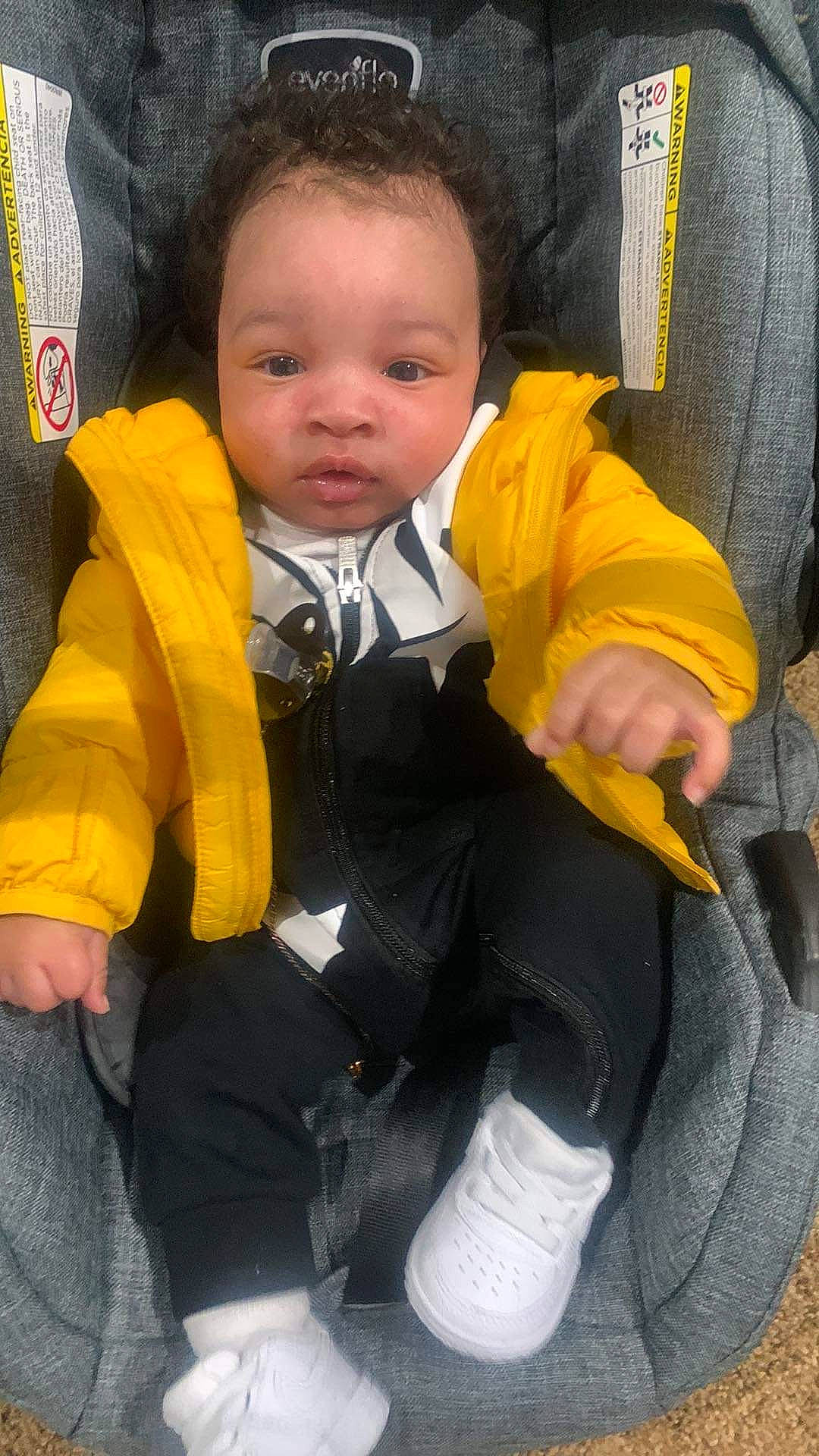 Amir joined the competition — help win amazing prizes! baby, baby_carriage, baby_products, baby_safety, baby_toddler_clothing, car_seat, cheek, child, comfort, face, finger, fun, head, lap, leg, person, personal_protective_equipment, sitting, skin, sleeve