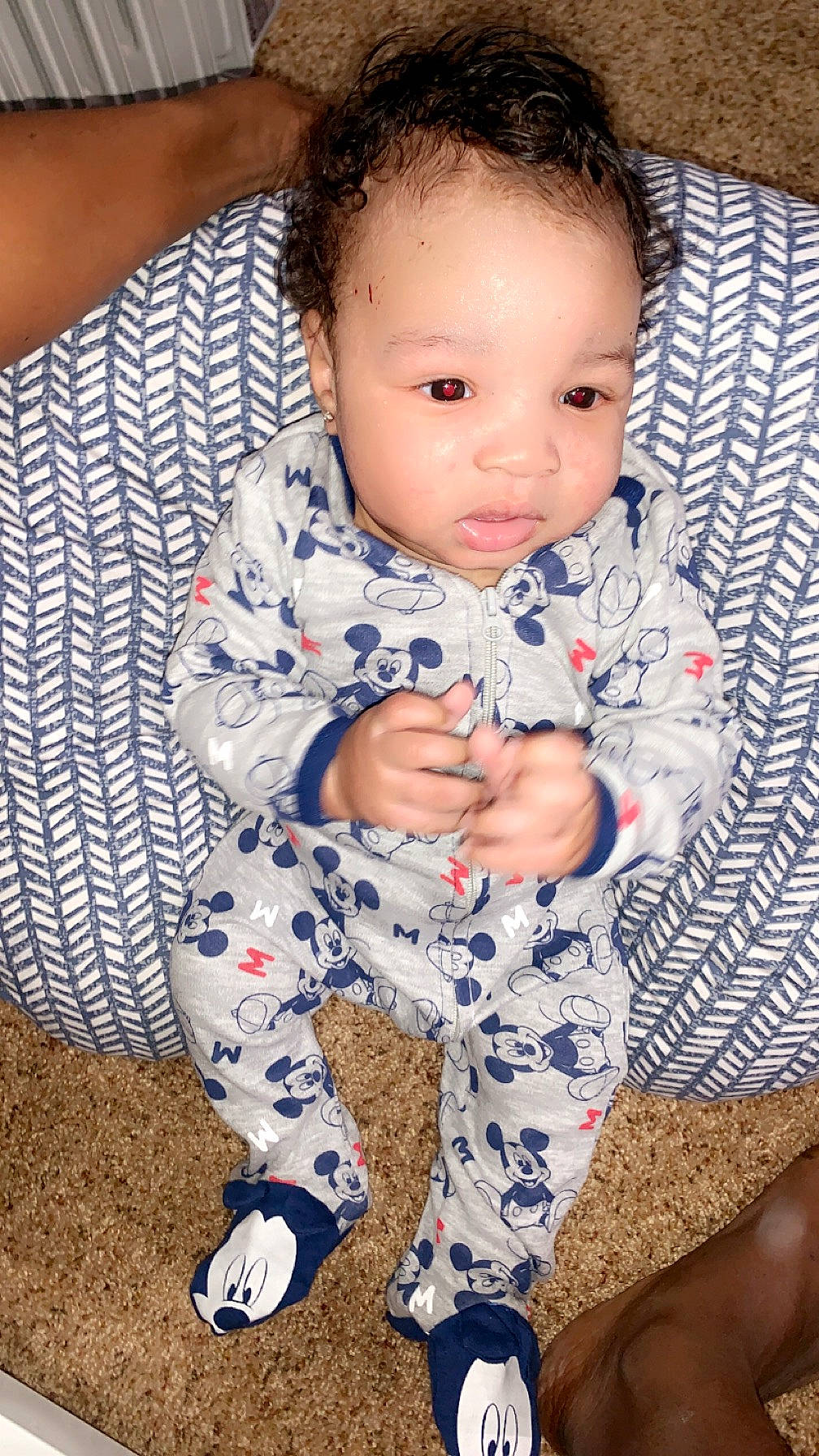 Amir is registered to the contest to win money with this photo: baby, baby_toddler_clothing, cheek, child, collar, comfort, electric_blue, face, flooring, fun, happy, iris, nightwear, nose, pattern, person, sitting, skin, sleeve, thigh