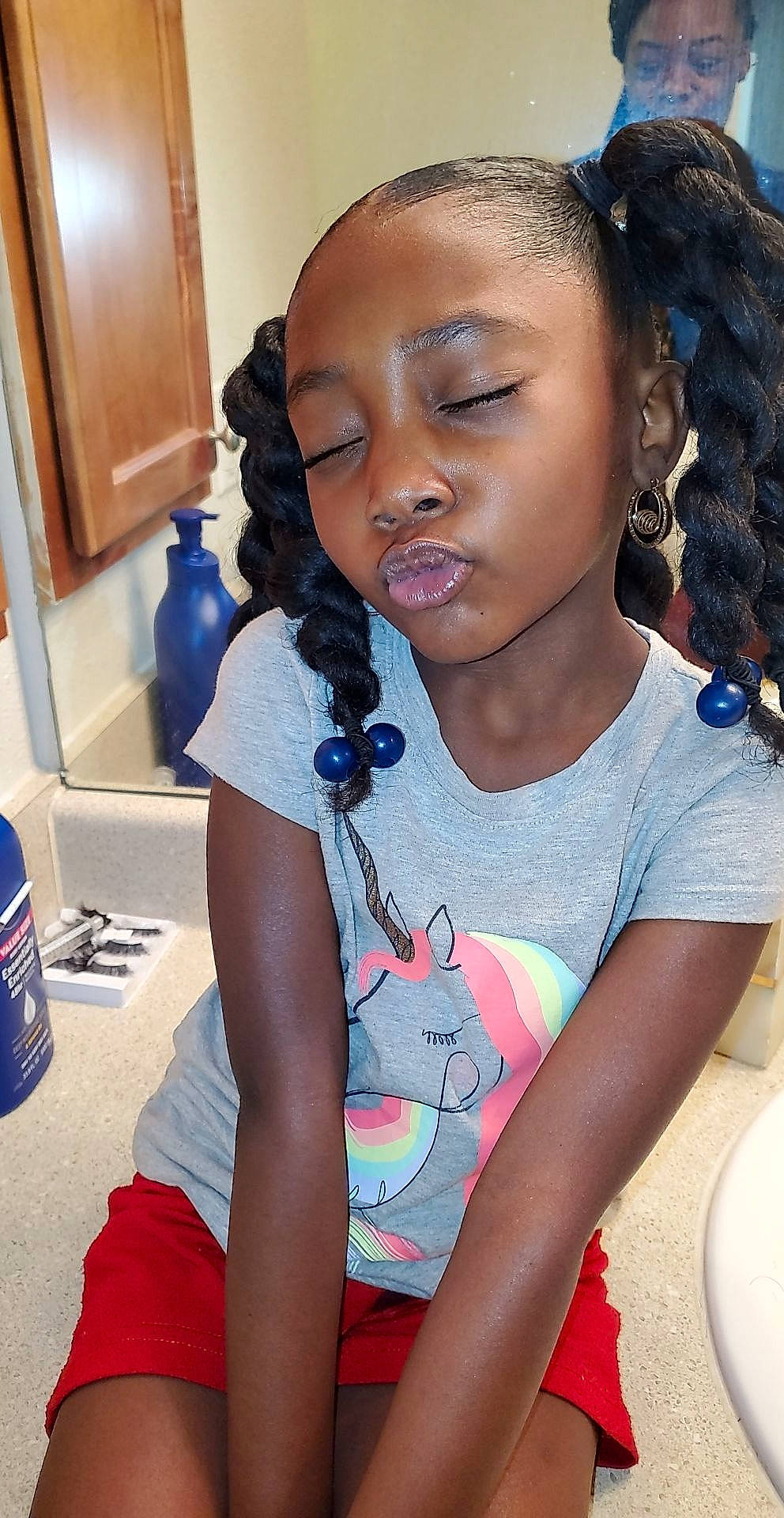 Heavenly is registered to the contest to win money with this photo: black_hair, blue, cheek, child, chin, cool, cornrows, dreadlocks, ear, eyebrow, forehead, fun, hair, happy, head, jewellery, long_hair, neck, nose, person