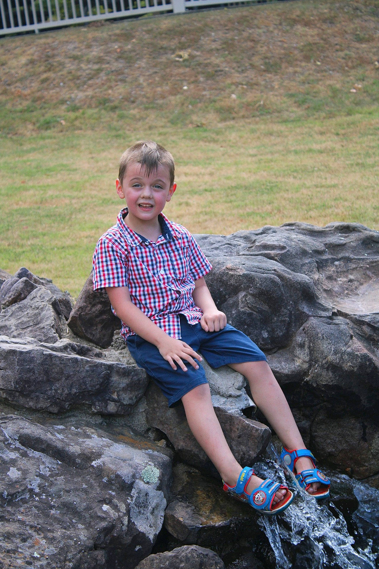 Ashtyn joined the competition — help win amazing prizes! bedrock, child, electric_blue, fun, geology, grass, happy, human_leg, joy, landscape, leg, leisure, people_in_nature, person, recreation, rock, shorts, smile, soil, t_shirt