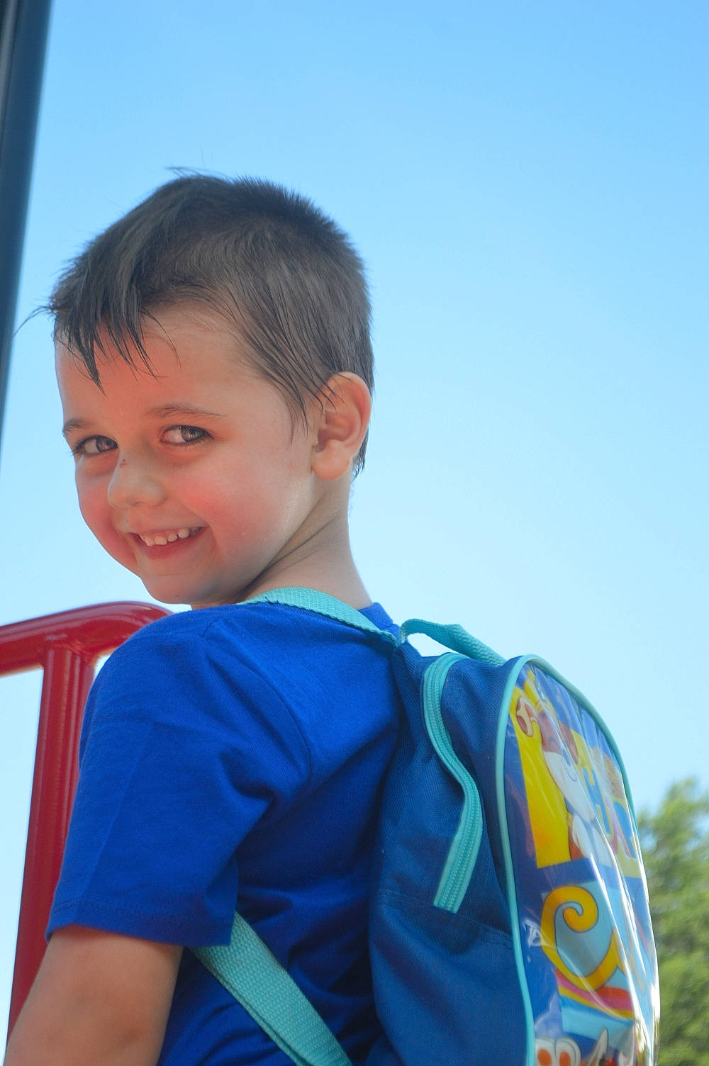 Ashtyn is registered to the contest to win money with this photo: azure, child, electric_blue, eye, fun, happy, human_body, inflatable, joy, leisure, neck, person, personal_protective_equipment, recreation, shoulder, sitting, sky, sleeve, smile, t_shirt