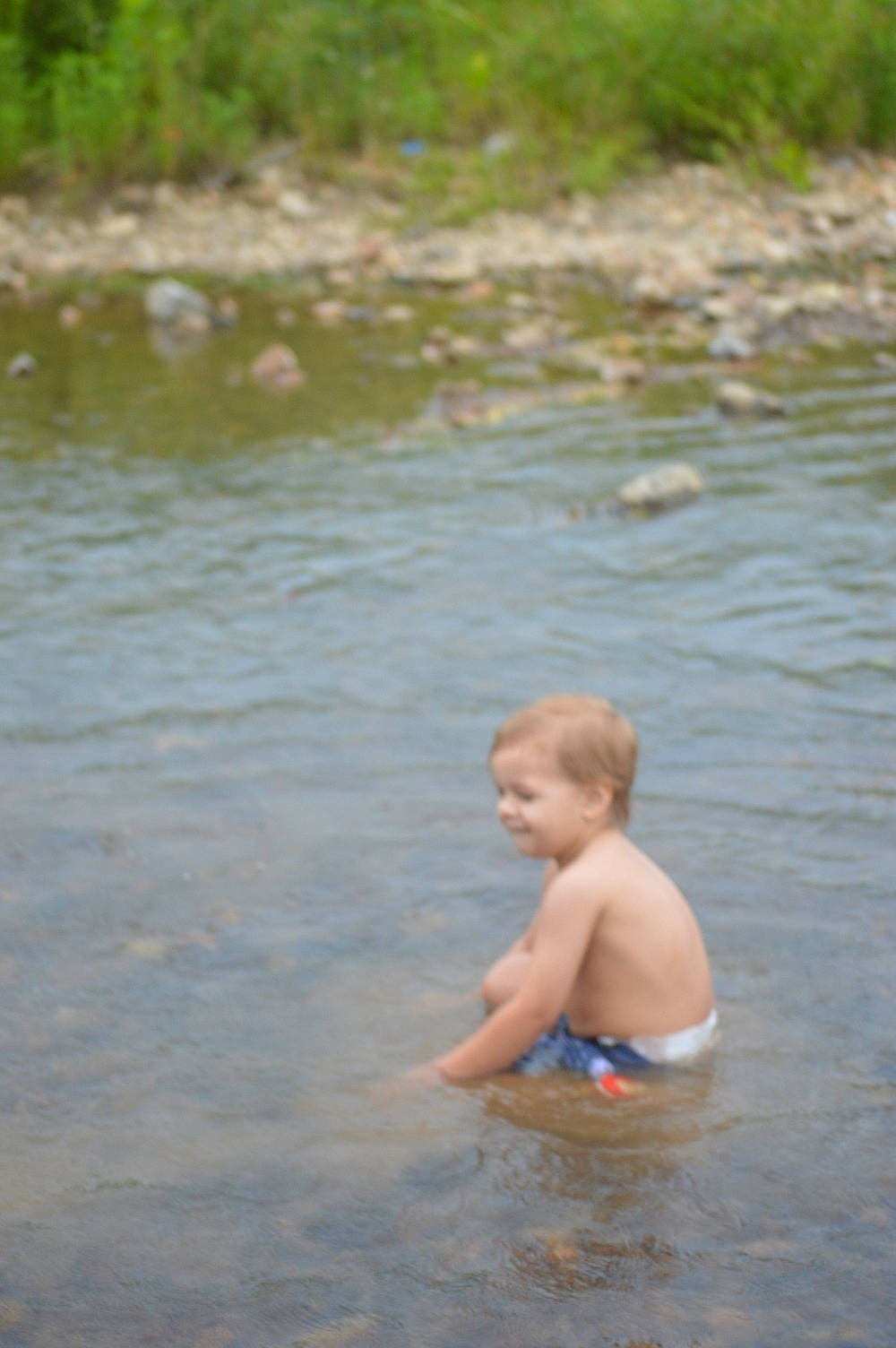 Damian joined the competition — help win amazing prizes! baby, bathing, chest, child, face, fluvial_landforms_of_streams, fun, grass, happy, head, lake, leisure, people_in_nature, person, plant, recreation, stream, toddler, vacation, water