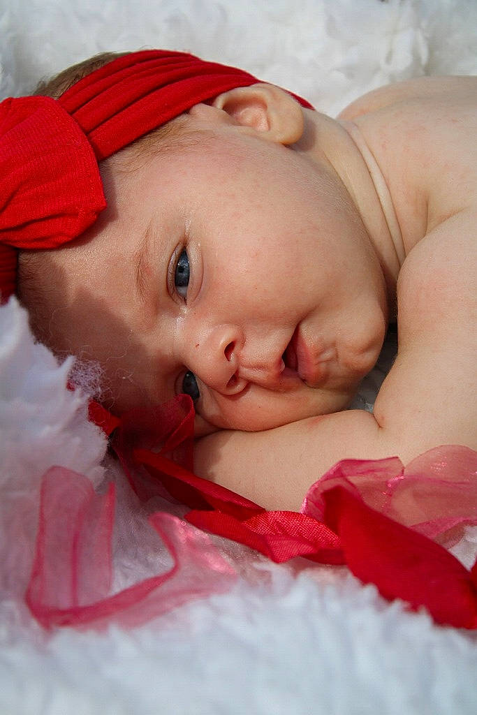 Thyra joined the competition — help win amazing prizes! baby, baby_toddler_clothing, cheek, clothing, comfort, eye, eyebrow, eyelash, facial_expression, headgear, human_body, lip, mouth, muscle, nose, person, pink, skin, sleeve, textile