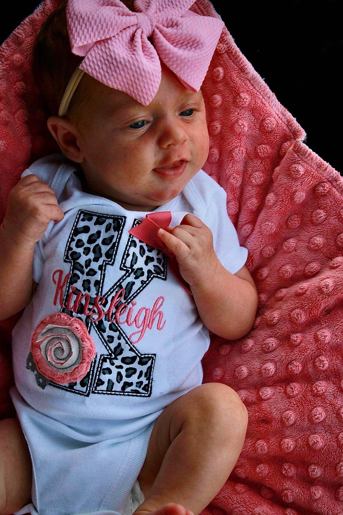 Kinsleigh joined the competition — help win amazing prizes! baby, baby_toddler_clothing, cap, cheek, cool, eye, face, hairstyle, happy, headwear, human, human_body, lip, organ, person, pink, red, skin, sleeve, t_shirt