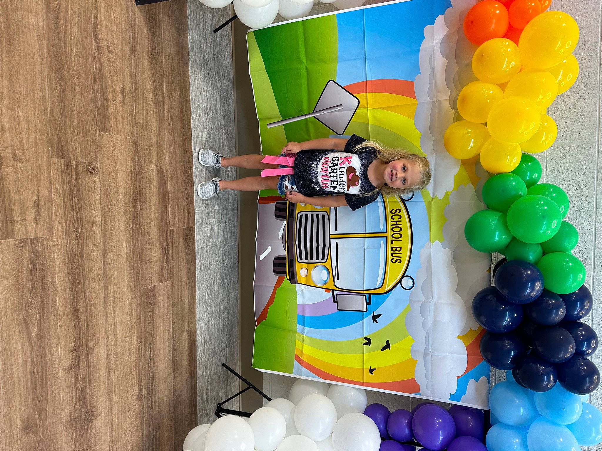 Addilynn joined the competition — help win amazing prizes! arch, balloon, circle, decoration, event, fun, happy, hardwood, joy, light, party, party_supply, pattern, person, recreation, smile, t_shirt, visual_arts, wood, yellow