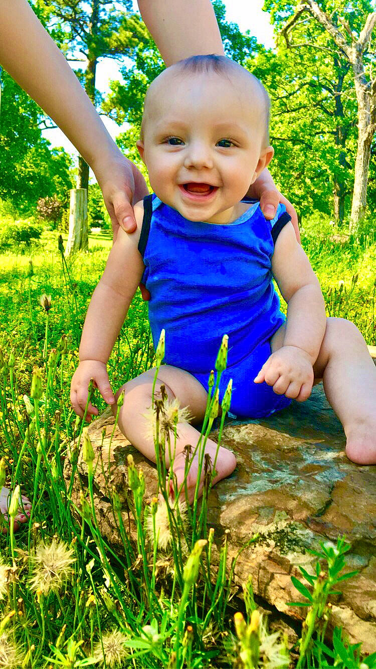 Briar joined the competition — help win amazing prizes! arm, baby_toddler_clothing, blue, eye, finger, grass, green, happy, head, iris, joy, leaf, natural_environment, people_in_nature, person, photograph, plant, skin, smile, sunlight