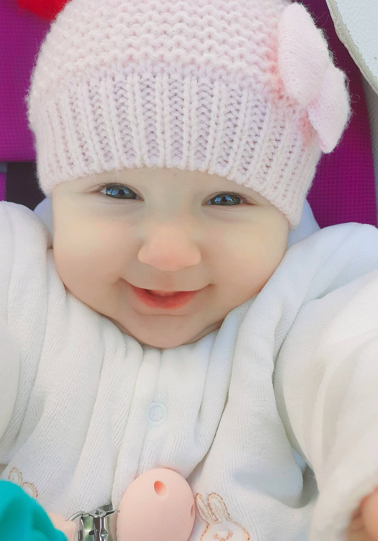 Svetlina participe au concours pour gagner de l'argent avec cette photo : baby, baby_toddler_clothing, cap, cheek, clothing, face, facial_expression, happy, headgear, headwear, joy, lip, outerwear, person, photograph, pink, product, skin, sleeve, smile