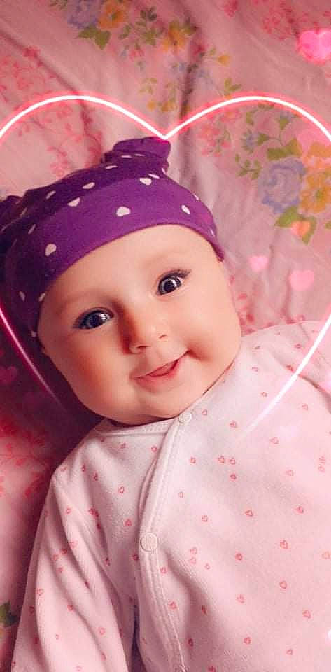 Svetlina participe au concours pour gagner de l'argent avec cette photo : baby, baby_toddler_clothing, cap, cheek, child, chin, collar, eyebrow, face, facial_expression, happy, headgear, headwear, lip, magenta, person, pink, skin, sleeve, smile