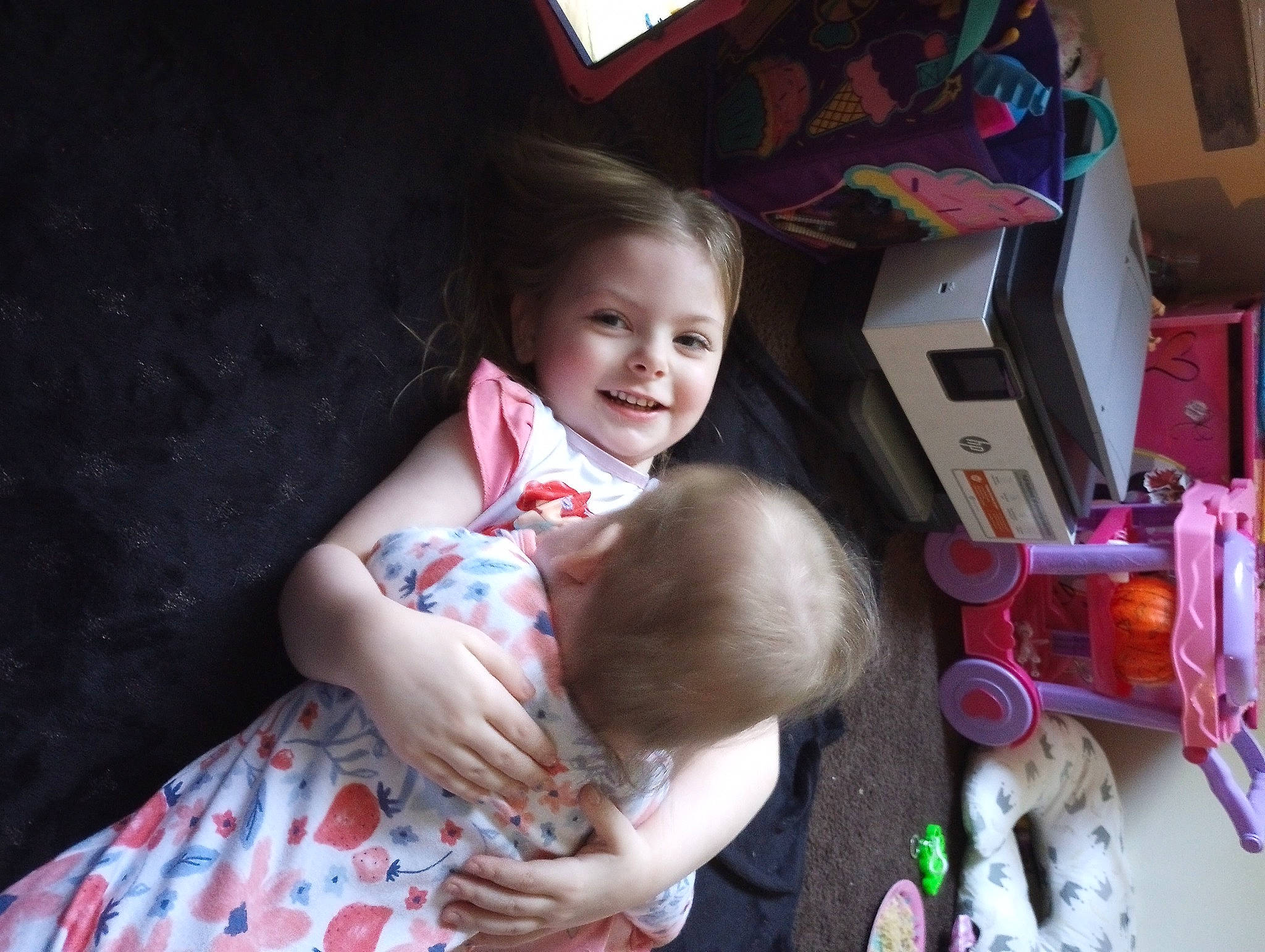 Aurora King joined the competition — help win amazing prizes! baby, child, couch, event, fun, happy, joy, lap, party, people, person, play, room, sitting, skin, smile, stuffed_toy, t_shirt, toddler, toy